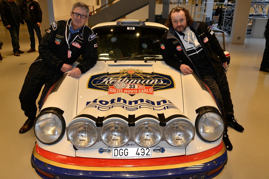 Et af Sveriges bedste bud på en topplacering: Stig Blomquists tidligere codriver Hans Sylvan finder vej for Mauritz Lange i denne Porsche 911. Her er de til teknisk kontrol i Bella Center.